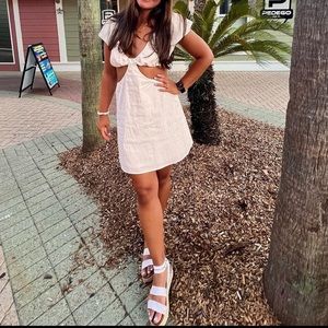 Super cute white cut out dress. Only worn once!
